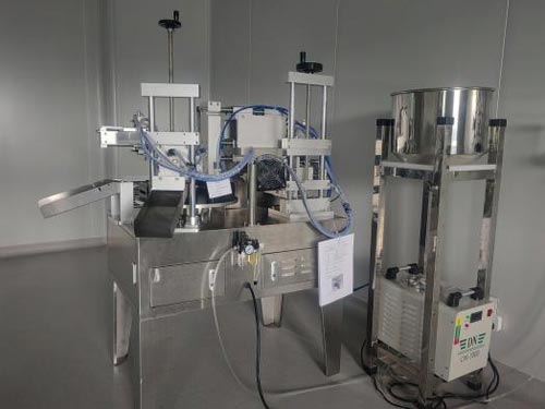 Secondary pouring and loading machine